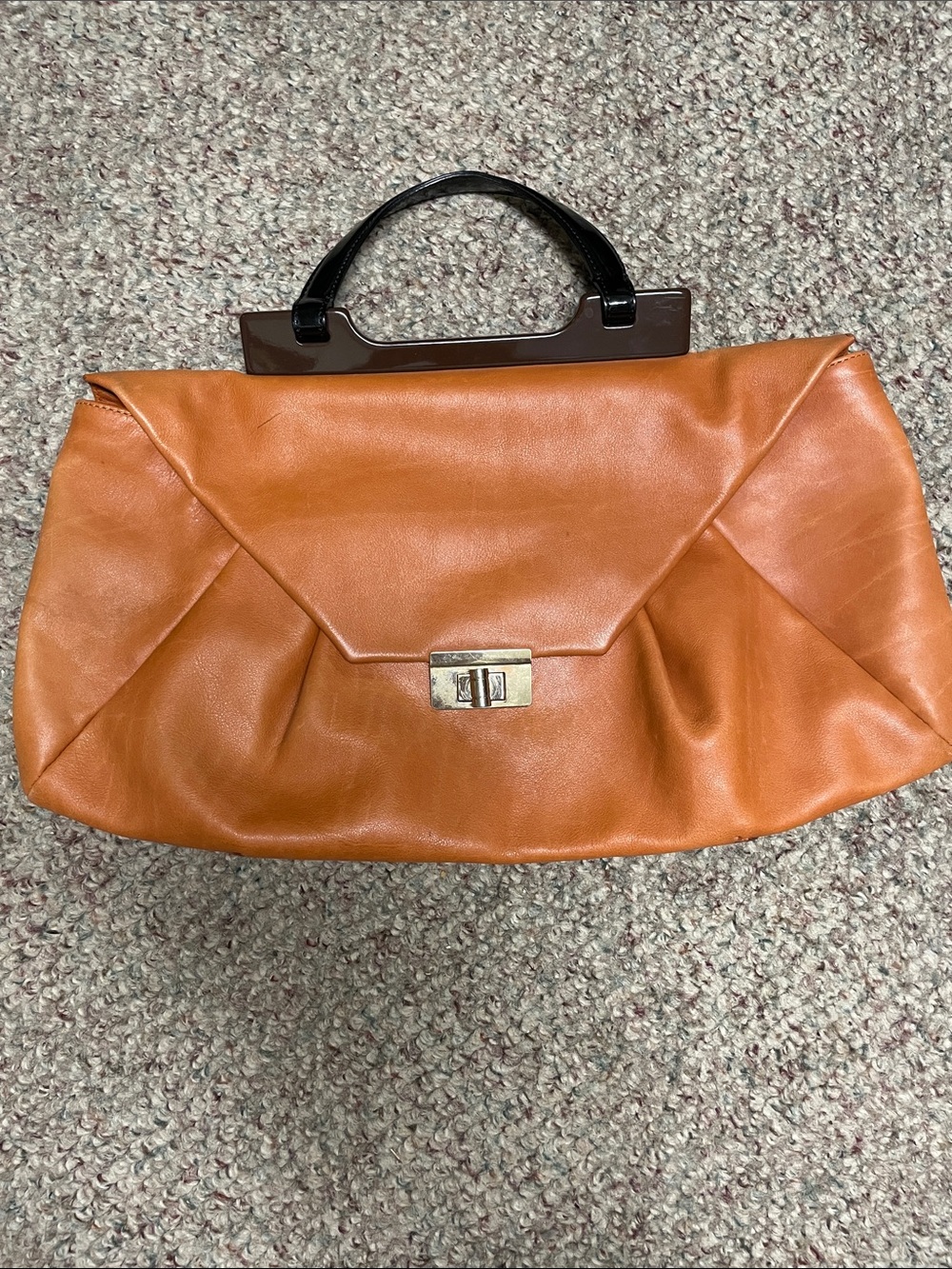 Marni burnt orange leather clip close envelope shaped top handle purse